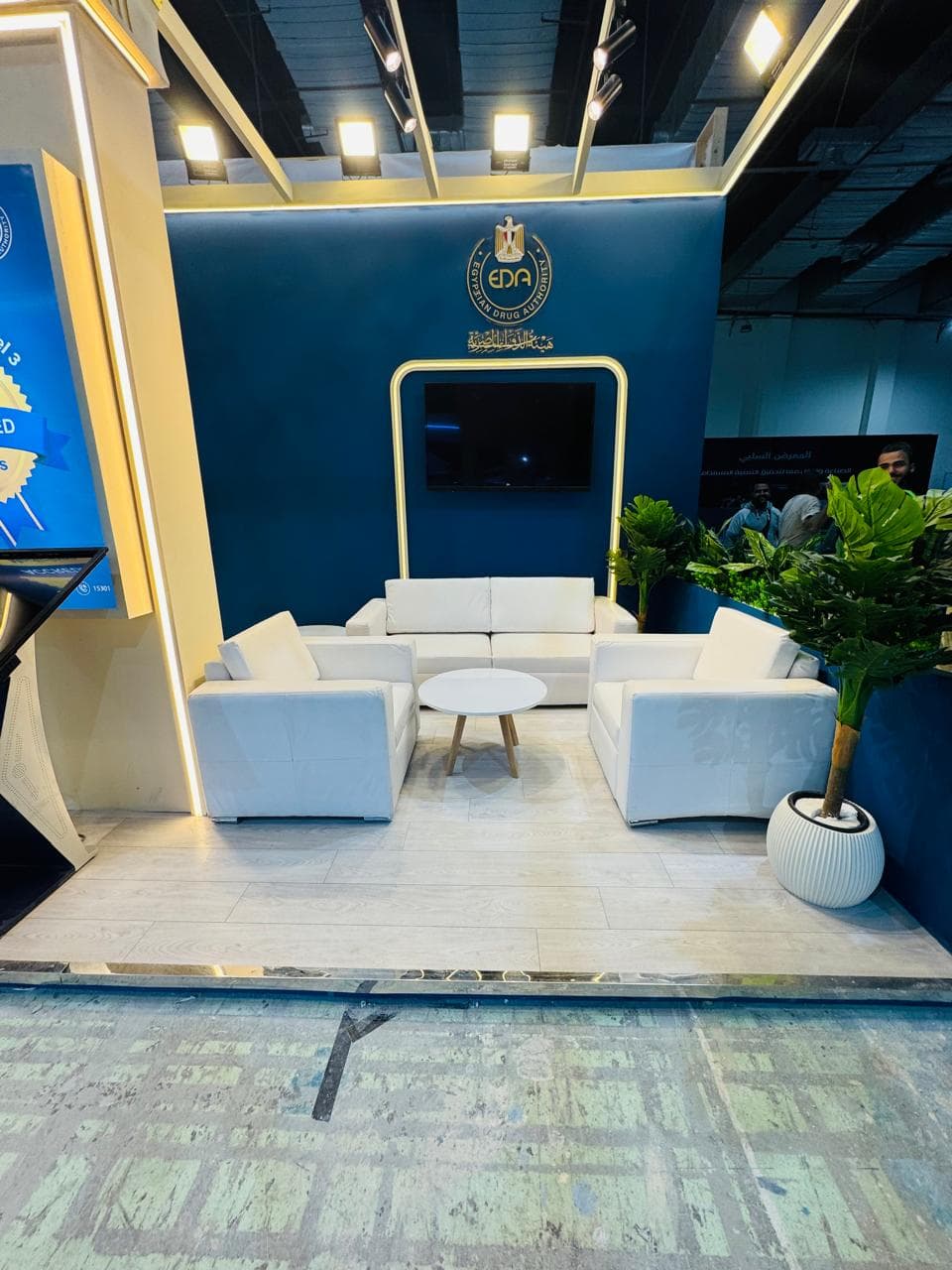 Curved illuminated reception desk, Equal's stand for Egyptian Drug Authority