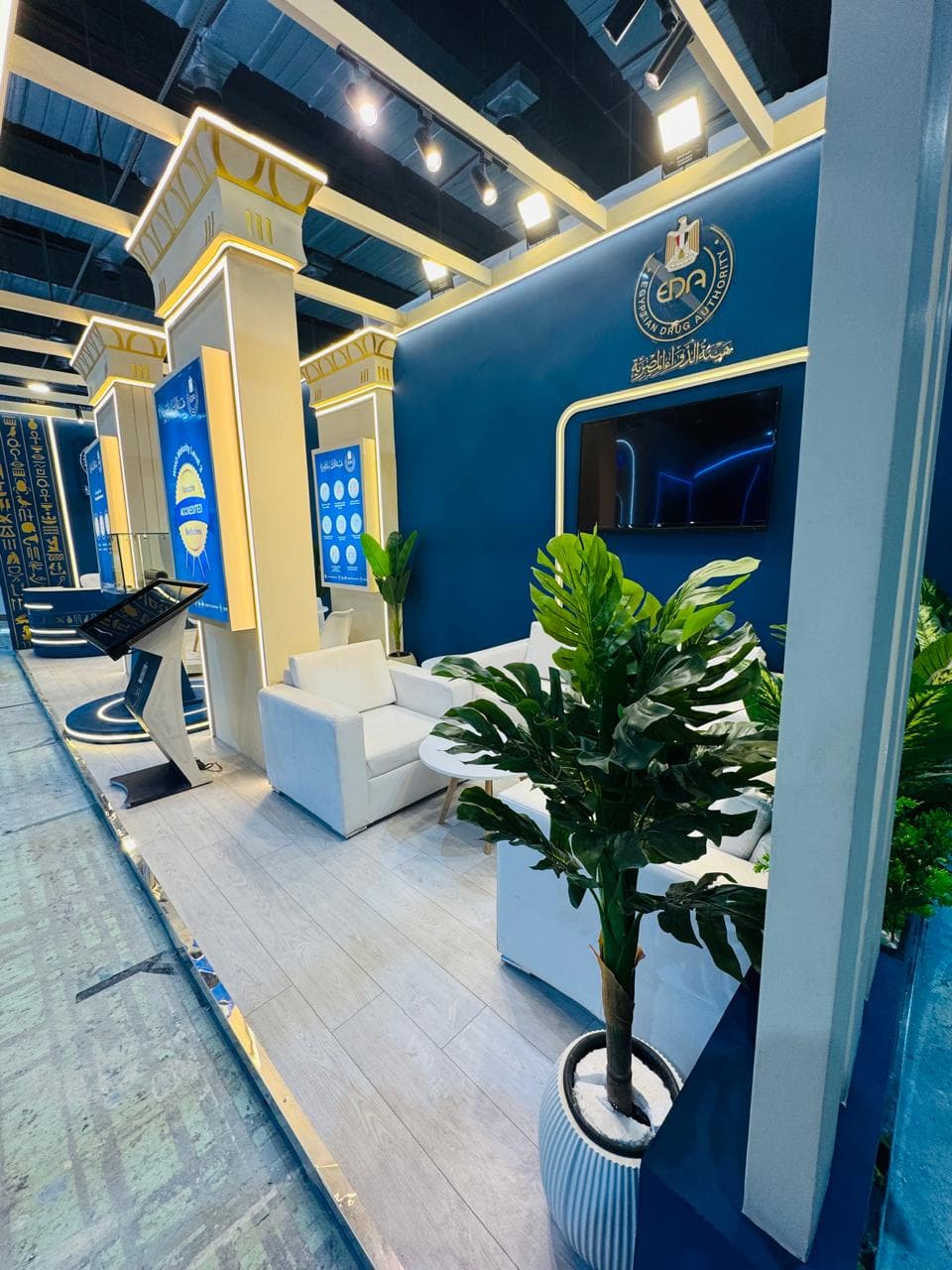 Navy-and-gold pavilion, full elevation, Equal's stand for Egyptian Drug Authority