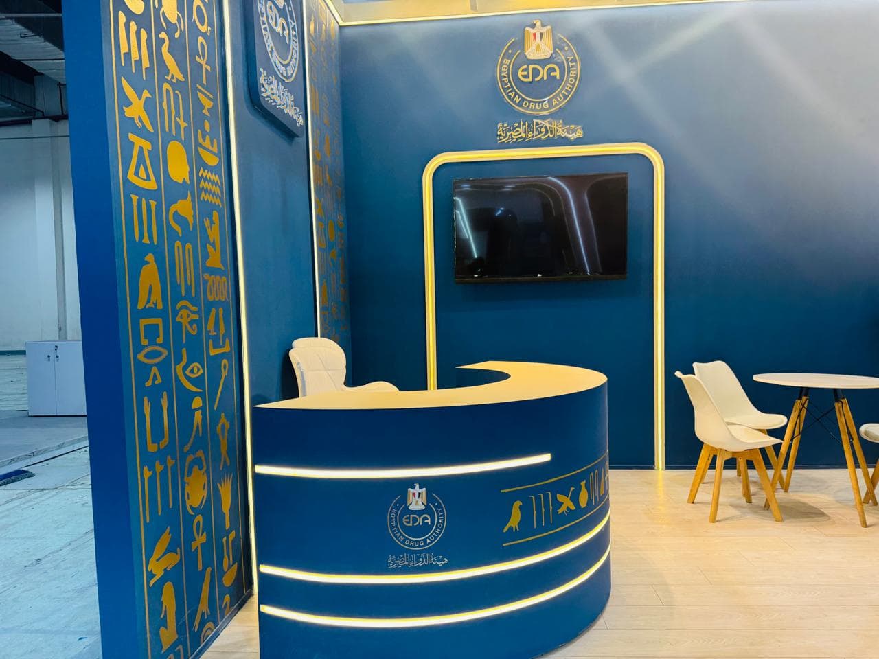 Hieroglyphic-panelled feature wall, Equal's stand for Egyptian Drug Authority
